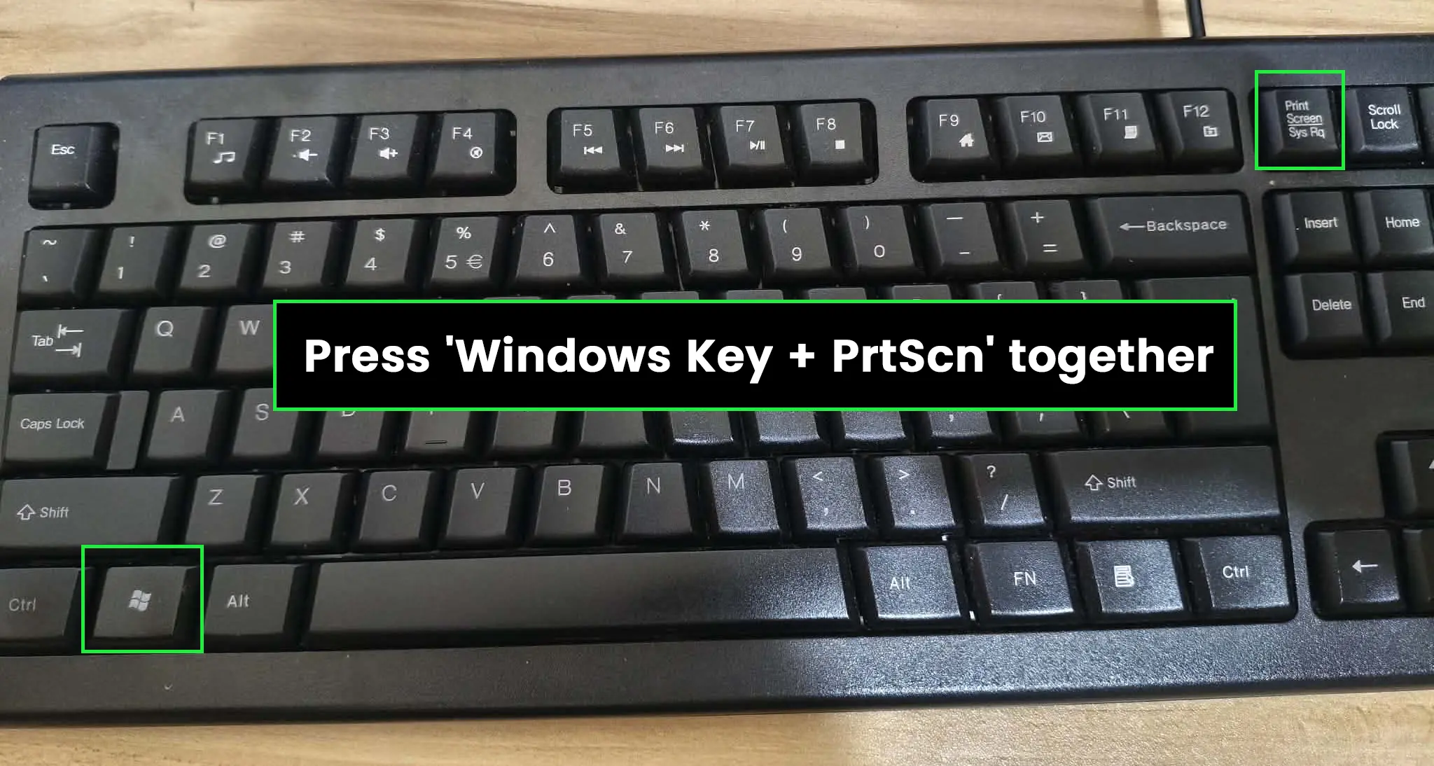 Press ‘Windows Key + PrtScn’ together