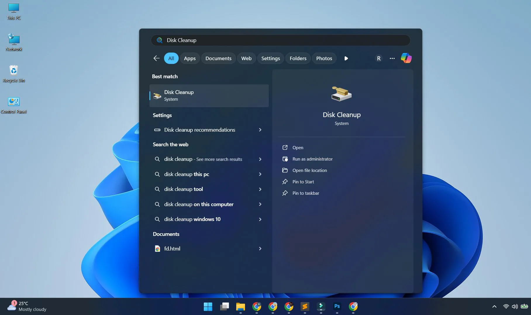Press Windows key + S and type 'Disk Cleanup'