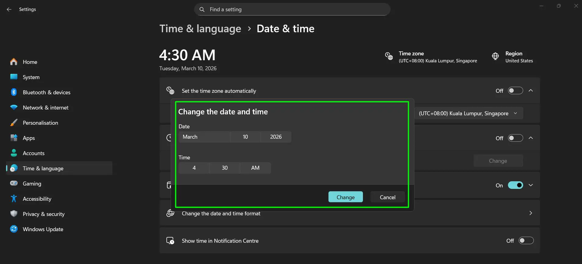 A small window will appear. Enter the correct date (month, day, year) and time (hour and minutes), then click Change to apply